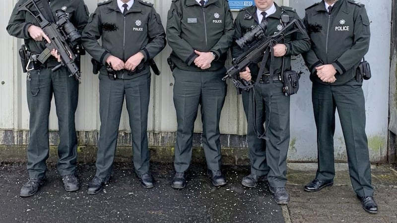 Simon Byrne posed with armed PSNI officers in Crossmaglen 
