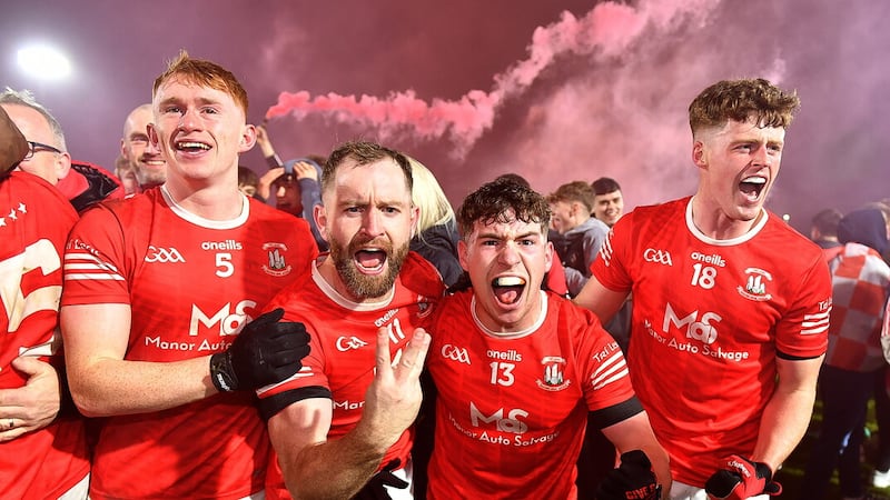 Niall Donnelly (second from left) celebrates his third Tyrone title alongside team-mates Seanie O'Donnell, Daniel Donnelly and Darragh McQuaid after Trillick's Tyrone final victory over favourites Errigal Ciaran. Picture by INPHO