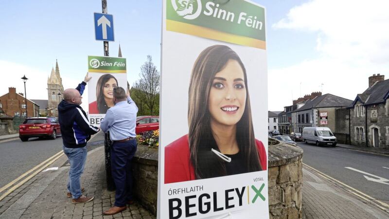 Sinn Fein election workers put up posters for candidate Orfhlaith Begley in Omagh canvasing for the upcoming West Tyrone by-election.  PRESS ASSOCIATION Photo. Picture date: Thursday April 26, 2018. See PA story ULSTER WestTyrone. Photo credit should read: Niall Carson/PA Wire 