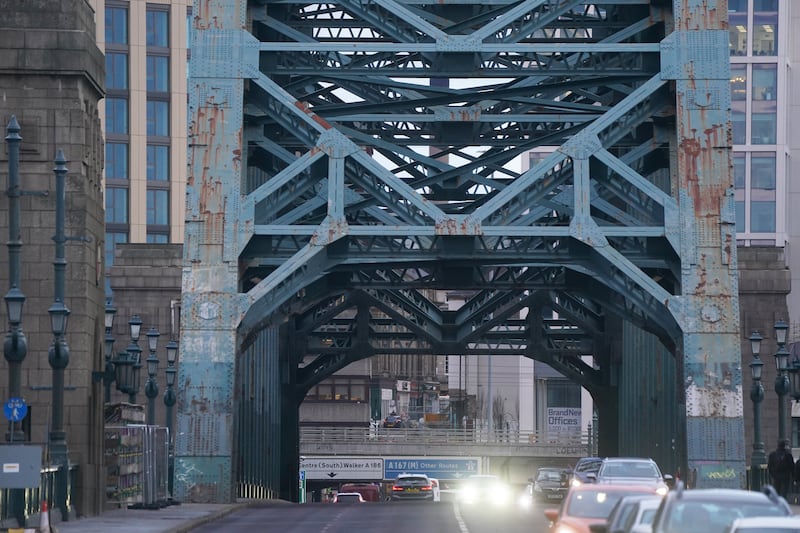 Traffic passes through the Tyne Bridge