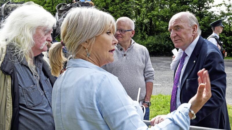 Shadow secretary of state Stephen Pound pledges to help victims of institutional abuse as they protest outside a garden party hosted by Karen Bradley in Co Fermanagh. Picture by Alan Lewis/Photopress