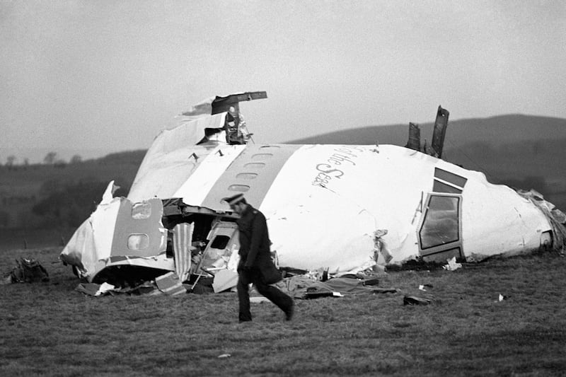 The wrecked nose section of the Pan-Am Boeing 747 lies in a field at Lockerbie