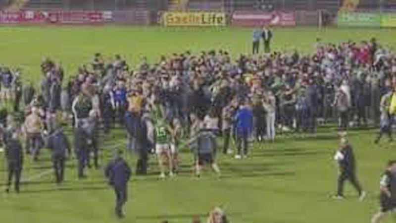 Fans invading the pitch after the win by the Dungannon Clarkes, their first Tyrone Football title in 64 years 
