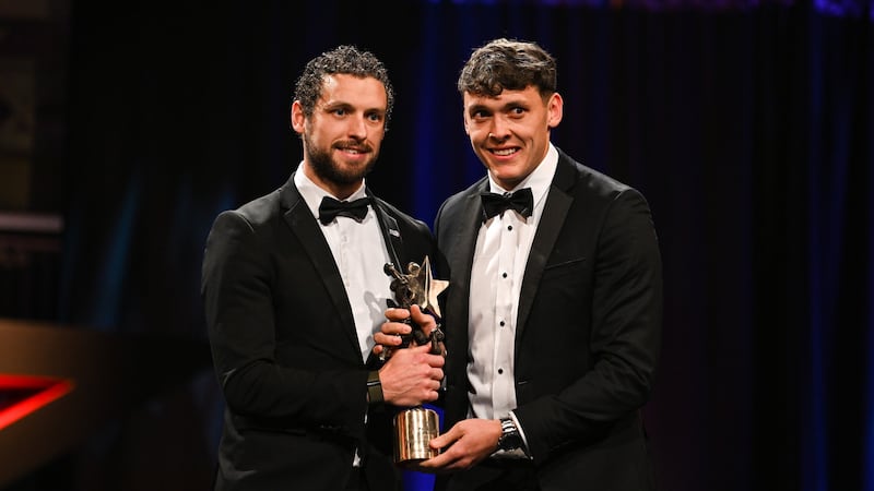 David Clifford receives his Footballer of the Year award from GPA chief executive, Tom Parsons Picture: Sportsfile