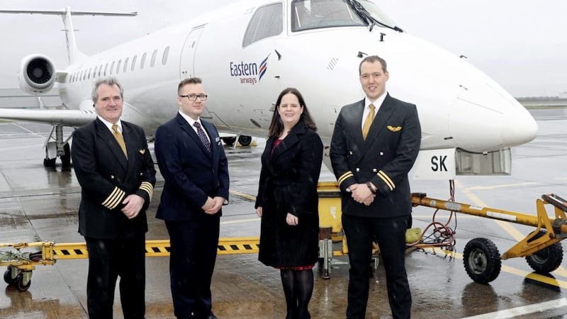 Pictured at the inaugural Eastern Airways flight into Belfast City are captain Leigh Kelly, first officer Tom Tansey and cabin crew member Lewis Evans, who are being welcomed by the airport&#39;s aviation development manager Ellie McGimpsey 