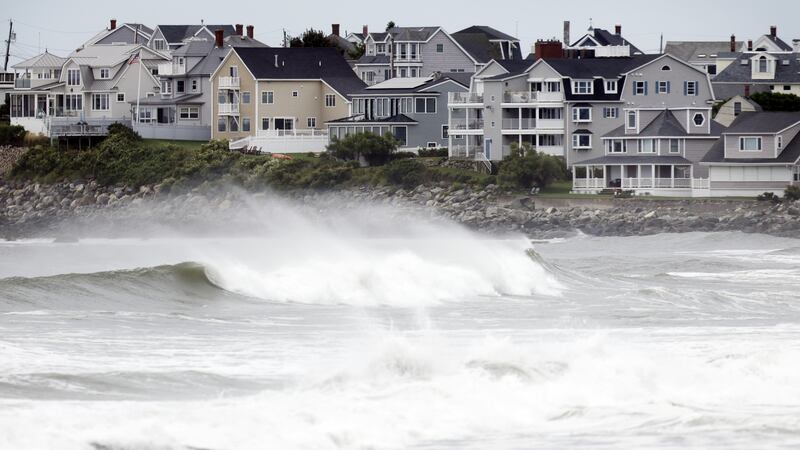 Waves come ashore in Hampton Beach (Michael Dwyer/AP)