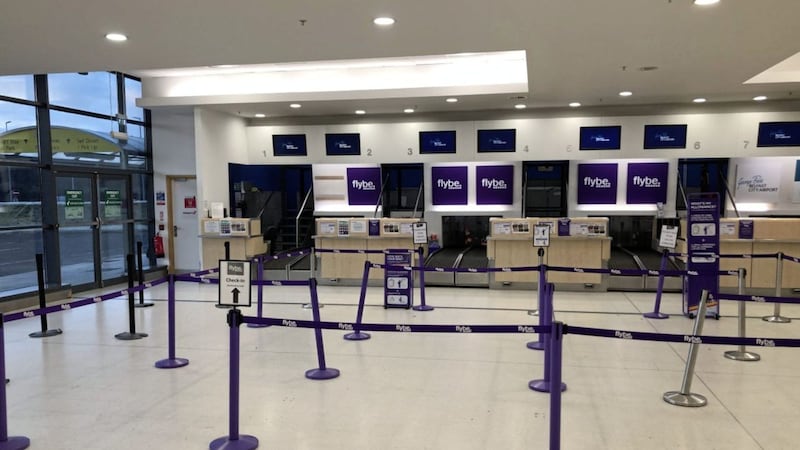 Unmanned check-in desks at Belfast Airport yesterday after Flybe collapsed into administration 