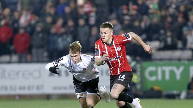 Derry City&#39;s Ben Doherty with Johannes Yli-Kokko of Dundalk during Friday night&#39;s match at Brandywell Picture: Margaret McLaughlin 