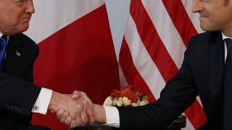 Trump may finally have met his handshake match in the French president.