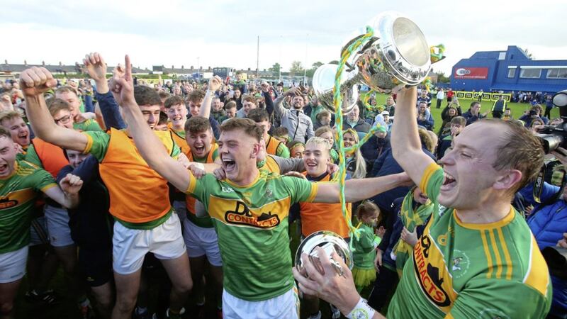 Dunloy captain Paul Shiels celebrates their three-in-a-row Picture by Mal McCann. 