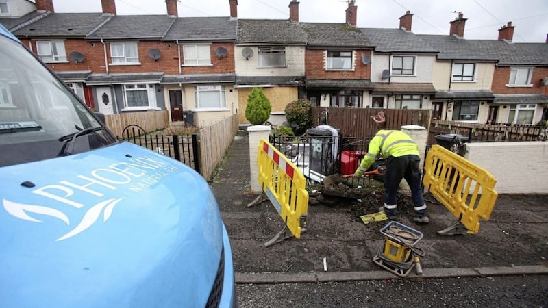 Contractors repair a gas supply after a fire caused a gas explosion at a house in Farringdon Gardens in Ardoyne. Picture by Mal McCann 