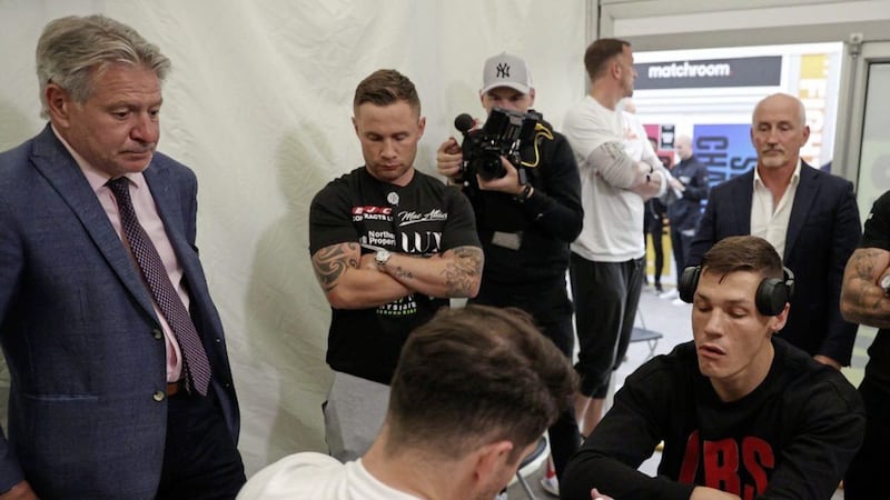 That&#39;s a wrap. Carl Frampton was in the Chris Billam-Smith dressingroom on behalf of Tommy McCarthy to observe his former trainer Shane McGuigan wrapping Billam-Smith&#39;s hands, watched also by Frampton is former manager Barry McGuigan 