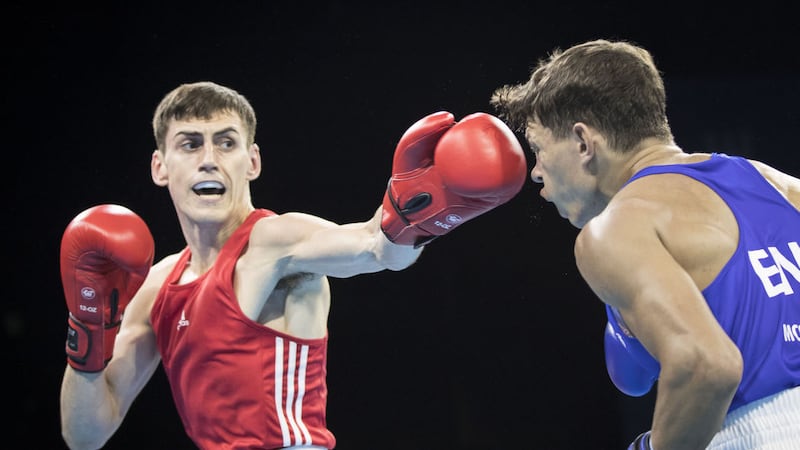Aidan Walsh in action against Pat McCormack in the welterweight final of the Commonwealth Games. Picture by PA