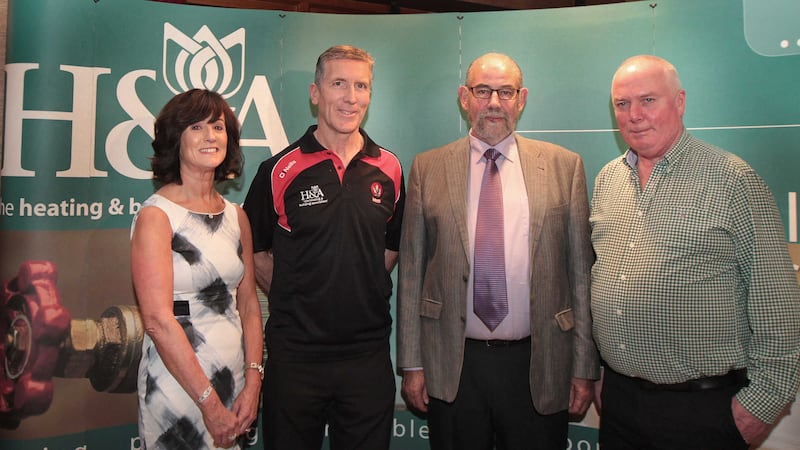 BACKING: New Derry senior football manager Damian Barton with Derry chairman Brian Smith and Hugh and Anne McWilliams of H&amp;A Mechanical Services Ltd, the new sponsors of Derry&rsquo;s inter-county football and hurling teams at minor, U21 and senior level&nbsp;Picture: Margaret McLaughlin