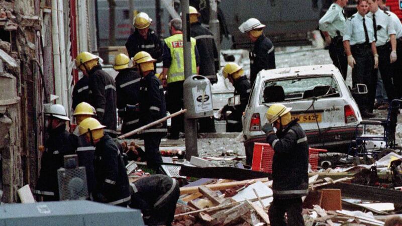 Police officers and firefighters inspecting the damage of the Omagh bomb in 1998. Picture by&nbsp;Paul McErlane/PA Wire&nbsp;