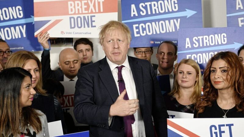 Boris Johnson at Conservative Campaign Headquarters Call Centre, London yesterday. Picture by Stefan Rousseau/PA Wire 