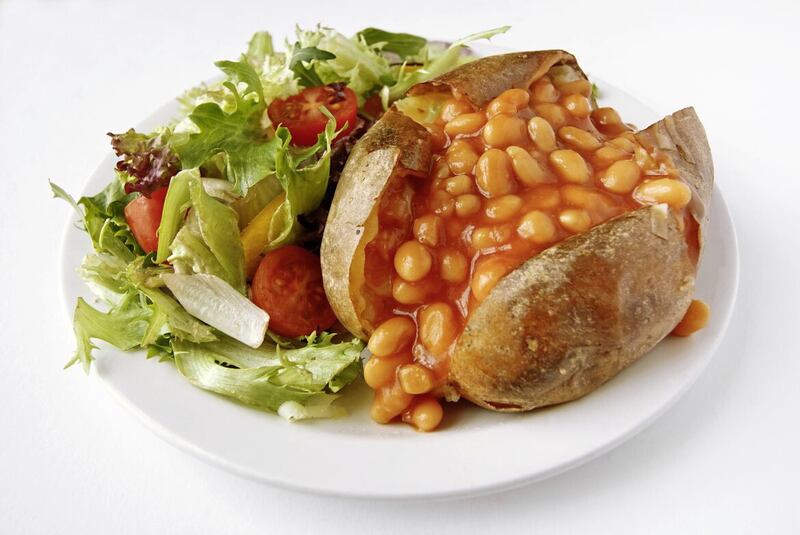 A baked potato with beans makes a healthy alternative to an ultra-processed lunch option 