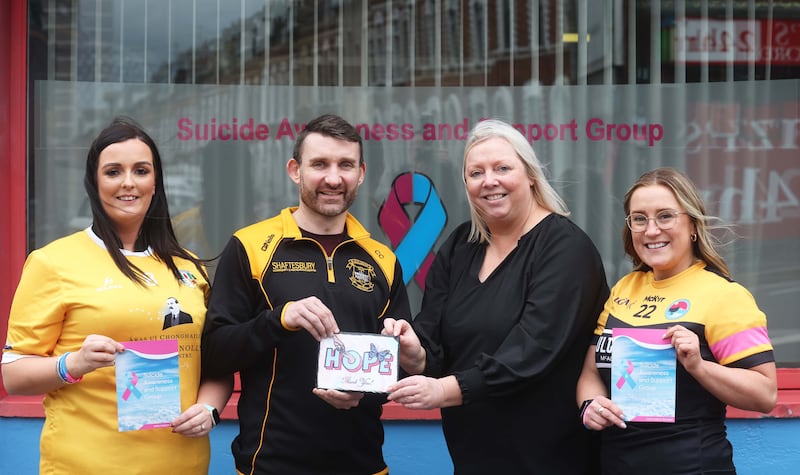 From L-R Stephanie Connolly (Friend of Darren), Colin Connolly (Friend of Darren) , Susan Conlan (Suicide Awareness) , and Sorcha Campbell (Friend of Darren) make a donation of £5,500 to Suicide awareness in Memory of also known as Horse, Who died suddenly in March last year, aged 41.
Money was raised after a weekend of GAA in February this year involving  Teams close to Darren including  Aldergrove Ladies, Laochra Loch Lao Ladies, Aldergrove Men’s, St Malachy’s, NI Fire & Rescue Service, Antrim Masters and Bredagh, followed by an evening of entertainment and fundraising. 
On Receiving the Donation Thanked all involved,
“On behalf of the Suicide Awareness and Support Group, can I avail of the opportunity to say a sincere thank you for your donation of £5,500.00
As you know, we endeavour to support those bereaved by suicide and help support those at risk of suicide. Your generous donation came at a timely period given the current economic climate where funding for services are hard to attain.
Your donation will help the organisation to provide vital counselling and therapy sessions. The possibility here is to effectively help change a life, or, by providing counselling for someone in suicidal crisis, can help save their life.
Your kindness and generosity has been profoundly appreciated by the bereaved families at the Suicide Awareness and Support Group. Families bereaved to Suicide believe that individuals can touch their hearts and our family members extend their sincere thanks to you and all who supported you in raising this amount”.
PICTURE COLM LENAGHAN