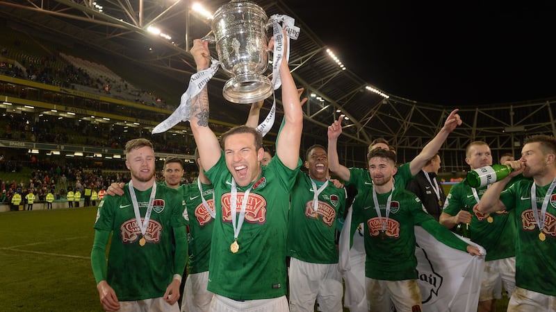 Karl Sheppard holds aloft the FAI Cup and celebrates with his Cork City team-mates following Sunday&rsquo;s extra-time win over Dundalk in the final at the Aviva Stadium in Dublin <br />Picture by Sportsfile