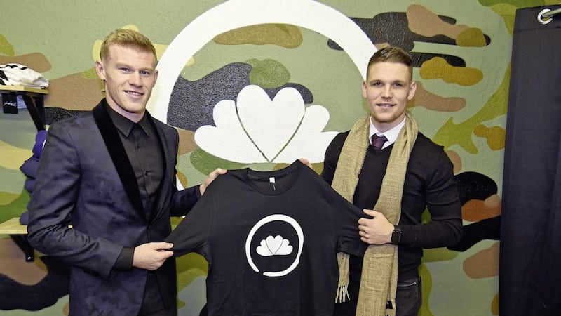 Ireland soccer star James McClean pictured with Derry City player Jordan Allan at the launch of clothing line-ThanksJosh 