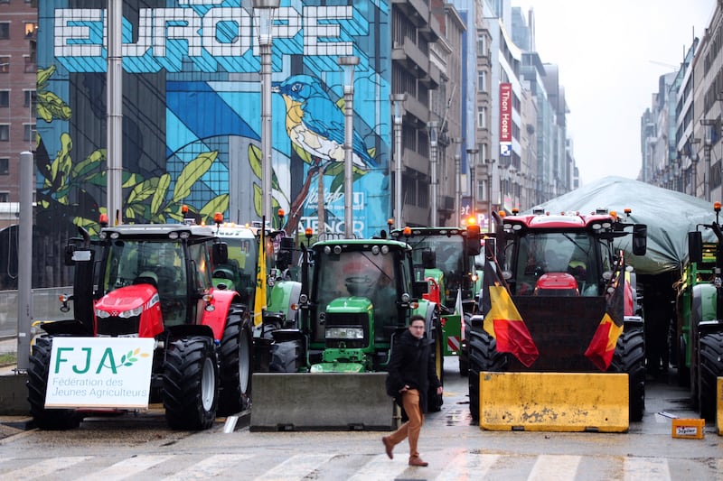 Tractors parked behind a blockade in the European Quarter during a protest of farmers outside a meeting of EU agriculture ministers in Brussels in February (Nicolas Landemard/AP)