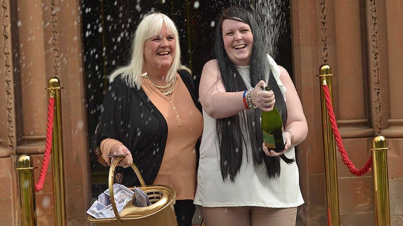 Belfast cleaner Maureen Wilkinson (58) celebrates with her daughter Kimberley McCaughey at the five-star Culloden Hotel after scooping a massive &pound;300,000 on a National Lottery Scratchcard