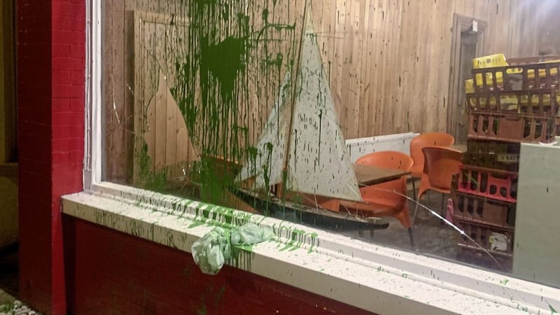 Masked men threw paint at Arden&#39;s of Whitehead on Monday night. Picture by Arden&#39;s of Whitehead/ Twitter 