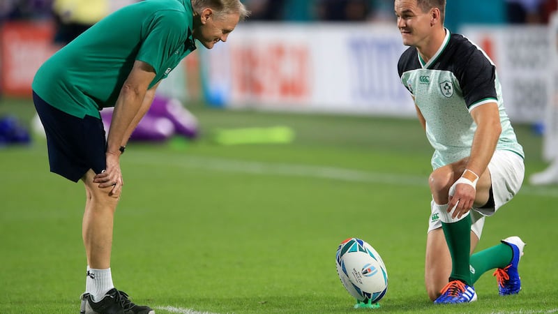 &nbsp;Ireland head coach Joe Schmidt (left) and Johnny Sexton during the 2019 Rugby World Cup Pool A match at the Kobe Misaki Stadium, Kobe City.<br />PA Photo.