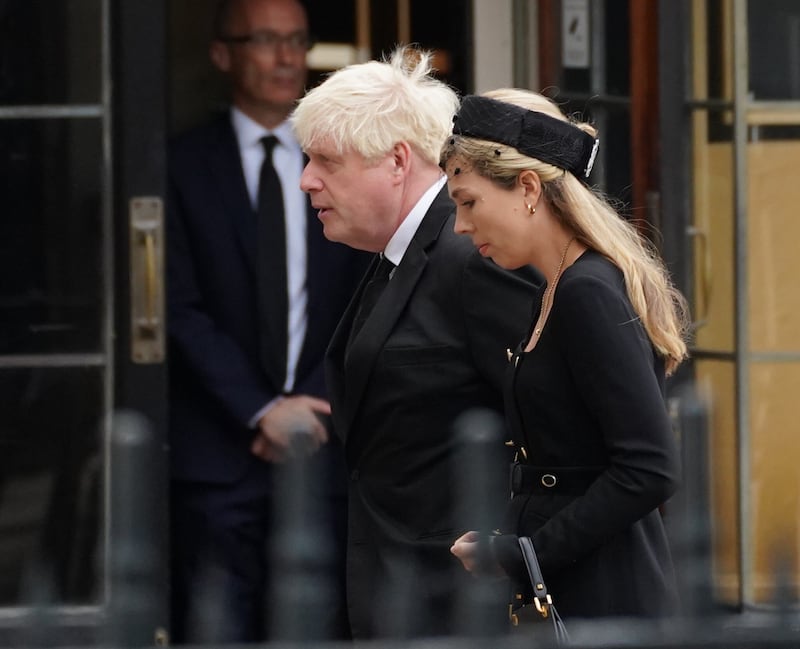Former Prime Minister Boris Johnson and wife Carrie arrive at the State Funeral of Queen Elizabeth II