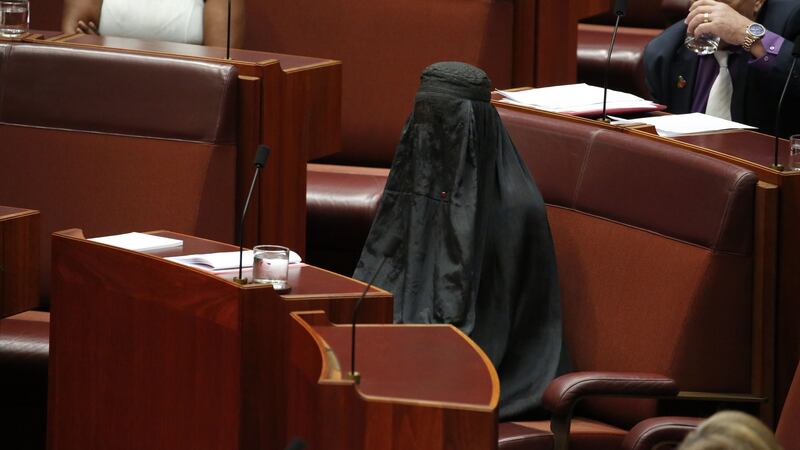 The One Nation leader caused a furore as she strode into the chamber wearing a full face covering.
