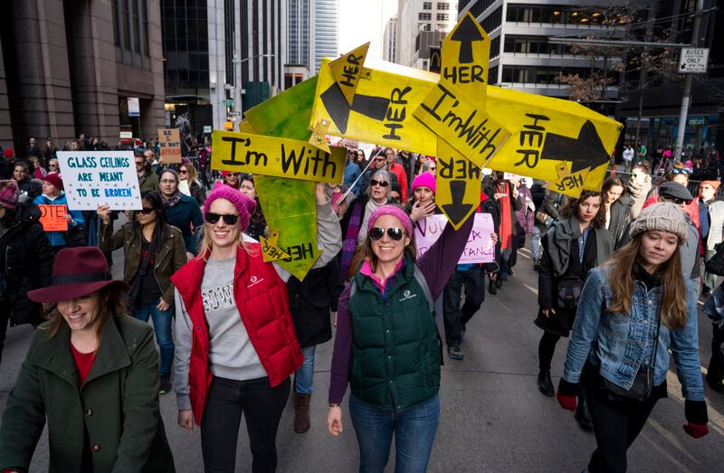 Two women hold an I'm with her sign in New York ( Craig Ruttle/AP)