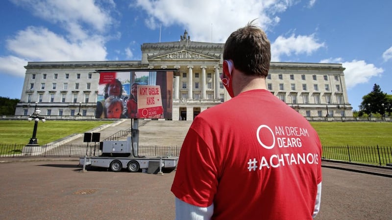 Irish language activists put their message across at Stormont. Picture by Mal McCann