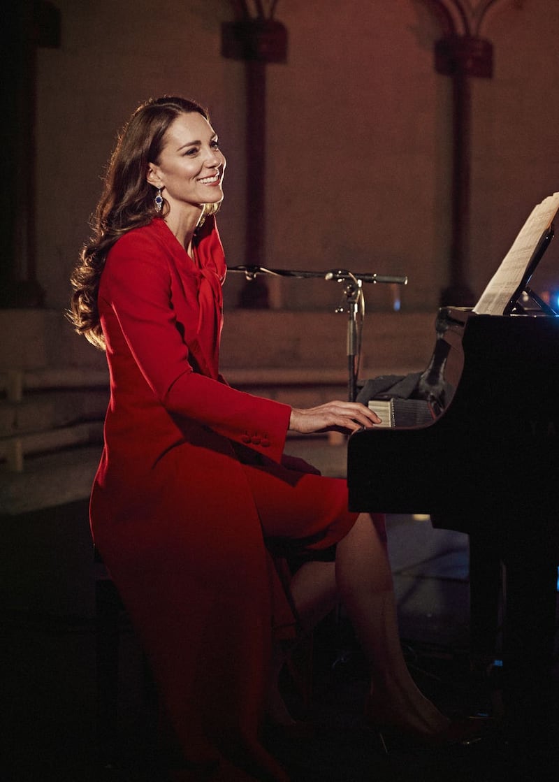 The Duchess of Cambridge accompanies singer Tom Walker on the piano during a performance of his song For Those Who Can’t Be Here 