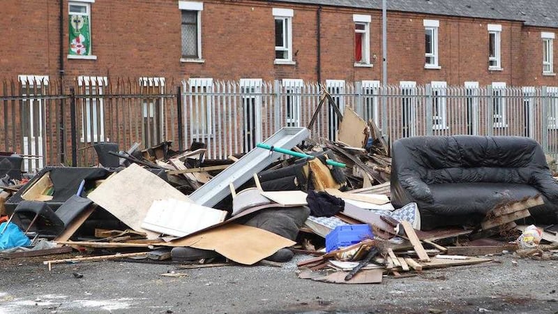 Illegal fly-tipping of household waste has seen items dumped at the bonfire site at Lanark Way in west Belfast. Picture by Matt Bohill 