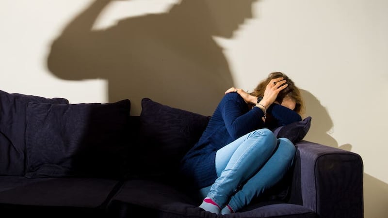 Picture posed by a model. Pre-Christmas reports of domestic abuse in Northern Ireland have spiked by 40% compared to last year, a senior police office said (PA)