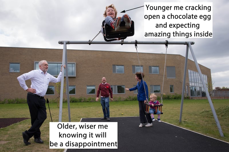 Corbyn watching a child on a swing