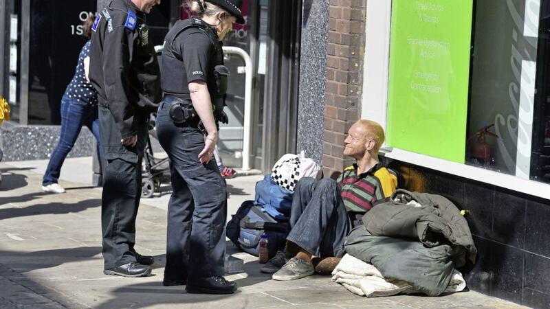 A police officer talks to a homeless man in Windsor, Berkshire ahead of tomorrow&#39;s wedding of Prince Harry and Meghan Markle Picture by Kirsty O&#39;Connor/PA 