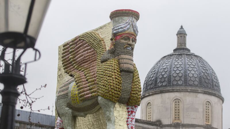 The sculpture has been made with 10,500 empty, Iraqi date syrup cans.