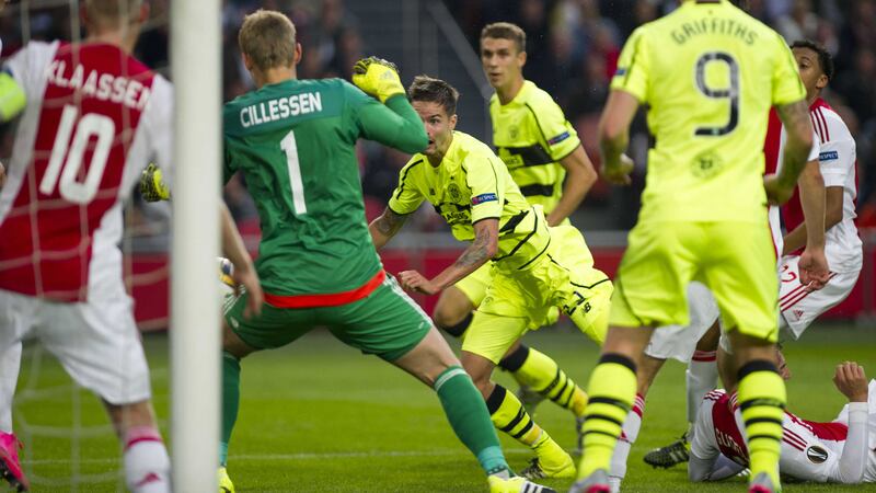 Celtic's Mikael Lustig heads home during Thursday's Europa League Group A tie against Ajax<br />Picture: PA
