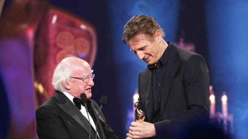 Liam Neeson receives the IFTA award for Outstanding Contribution to Cinema from President Michael D Higgins&nbsp;