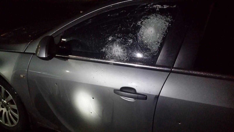 Police have released this picture of the damage caused to a police car when it was targeted in a gun attack