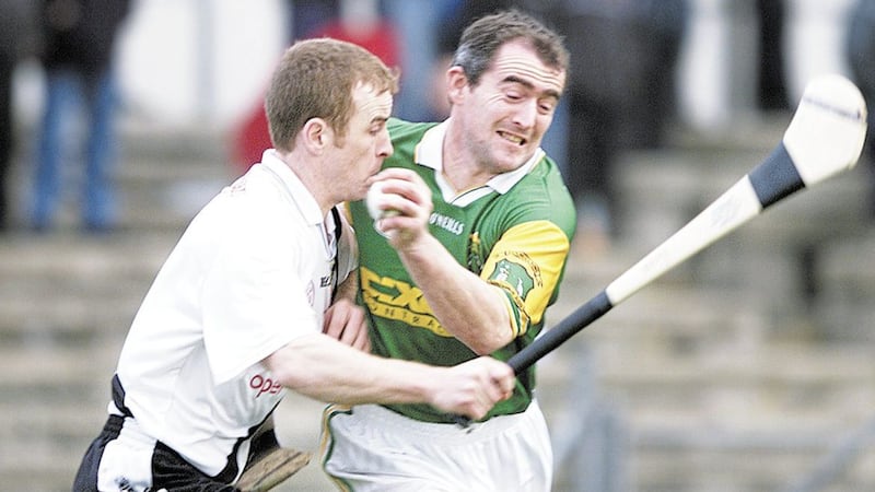 Allister Elliott (right), pictured here against Emmett McKeever of Kevin Lynch&#39;s, was in fine form for Dunloy in their 1998 All-Ireland semi-final.  