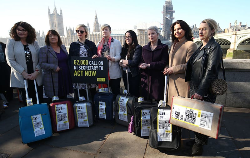 Labour MP Stella Creasy (third left) and Independent Group MP Heidi Allen (second right) join women impacted by Northern Ireland's strict abortion laws who are carrying suitcases, symbolising the women who travel from Northern Ireland to Great Britain for terminations, across Westminster Bridge demanding legislative change&nbsp;