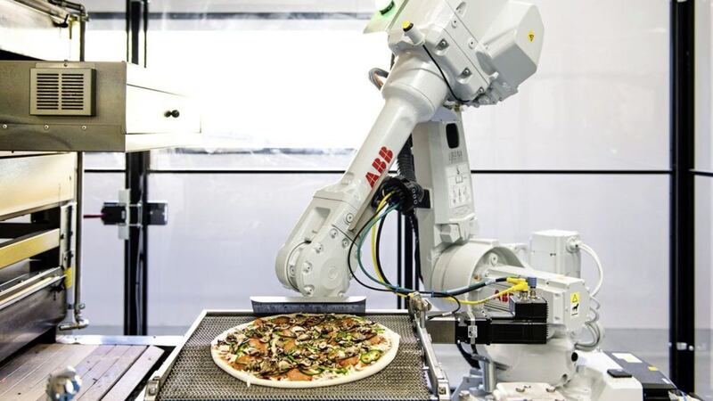 Californian pizza maker Zume is using robots make 372 pizzas an hour - and the robots are five times faster than humans 