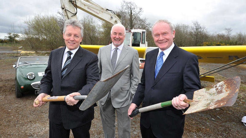 Peter Robinson and Martin McGuinness with Maze Long Kesh Development Corporation chair Terence Brannigan at the site in 2013 