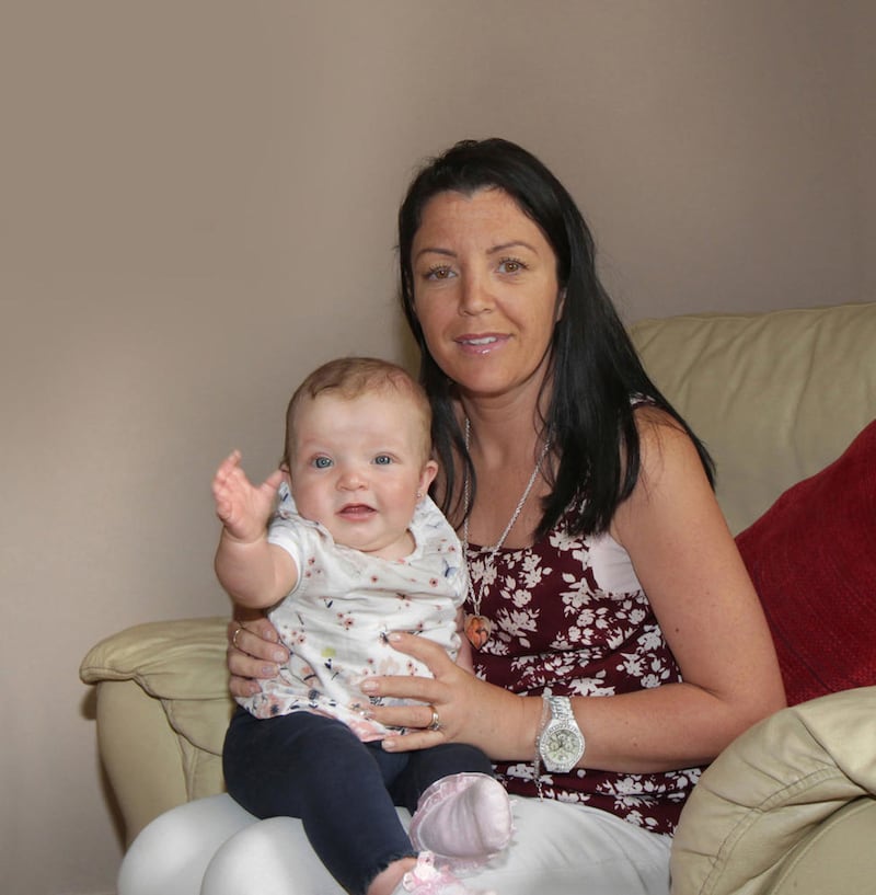 Baby Rioghnach McGrotty and her mum Louise at their home in Derry. Picture Margaret McLaughlin.
