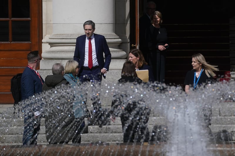 Taoiseach Simon Harris greets families of the survivors and victims of the Stardust fire at Government Buildings in Dublin