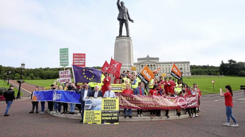 Harland &amp; Wolff workers and Irish language activists, Border Communities Against Brexit, legacy campaigners came together at the statue of Edward Carson to protest yesterday as Boris Johnson met with political parties at Stormont House. Picture by Mal McCann 