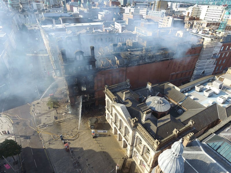 Firefighters continued to douse the embers at Primark this morning.&nbsp;Picture by Gregory Weeks
