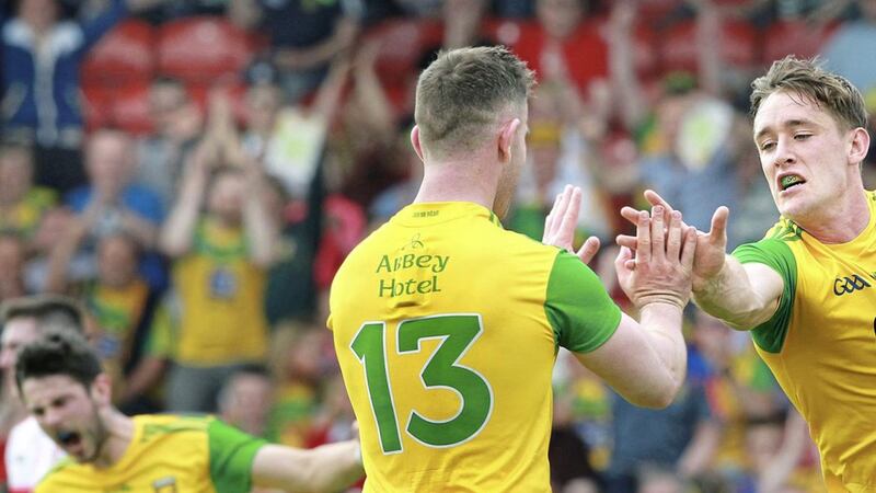 Hugh McFadden of Donegal celebrates his goal against Derry with Paddy McBrearty during the Ulster Senior Football Championship quarter final at Celtic Park. Picture Margaret McLaughlin. 